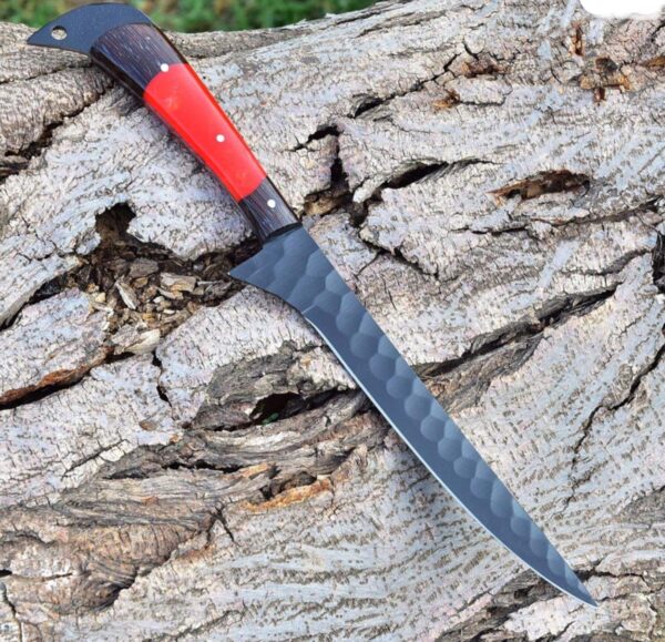 Handcrafted Damascus steel fillet knife with razor-sharp blade and elegant pattern