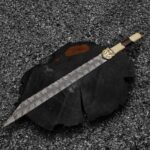 Handcrafted Damascus Seax sword with Viking-inspired blade and layered steel pattern